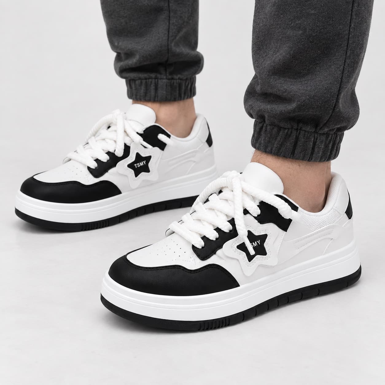 Black and white sneaker — White